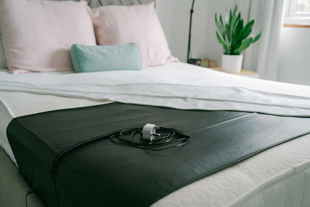 Universal Grounding Sheet on a Bed