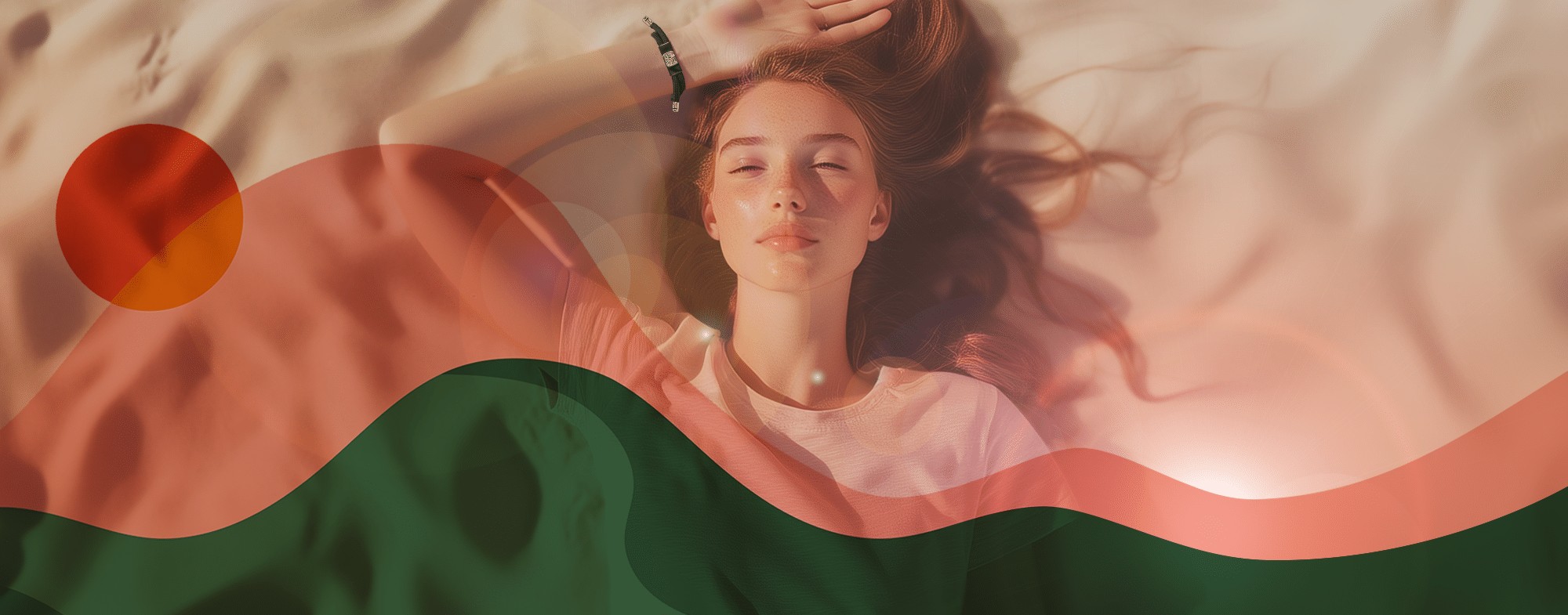 A young woman lies on sand with eyes closed, sunlight on her face. Abstract red and green wavy shapes and a red circle overlay the image, giving a dreamy, artistic effect.